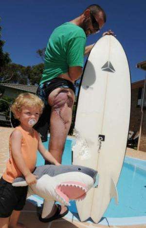 The fibreglass of his surfboard is thought to have saved Glen Flokard's life during a shark attack