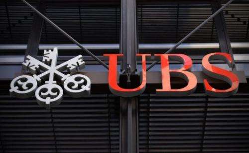 The logo of Swiss bank UBS is pictured outside the company offices in the City of London
