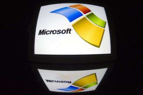 The Microsoft logo is seen on a tablet screen on December 4, 2012 in Paris