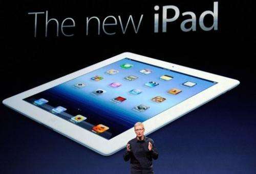 The new iPad boasts a more powerful processor, eye-grabbing resolution on par with that of an iPhone 4S