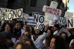 Thousands protest Spain's health care austerity