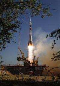 Three-man Soyuz crew departs for space station (AP)
