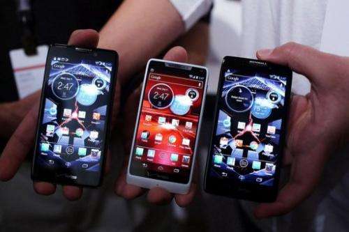 Three Motorola Razr smartphones, which all use Google's Android operating system