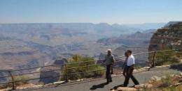 US President Barack Obama and his daughter Malia check out the Grand Canyon in 2009