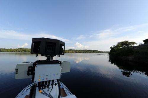 View of a 360-degree camera system mounted on a Trike atop a boat by Google team members