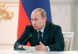 Vladimir Putin hailed a series of tie-up with foreign oil firms to explore the Arctic