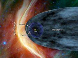 Voyager 1 and Voyager 2 are portrayed at the edge of the solar system in an artist's rendition