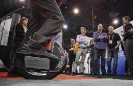 Weird gadgets at CES: Motorized unicycle, anyone? (AP)