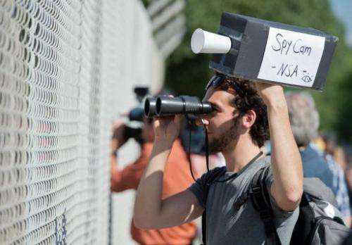 A man protests outside a US National Security Agency listening station in Darmstadt, Germany, on July 20, 2013