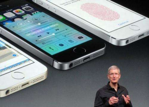 Apple chief executive Tim Cook introduces the new iPhone 5S on September 10, 2013 in Cupertino, California