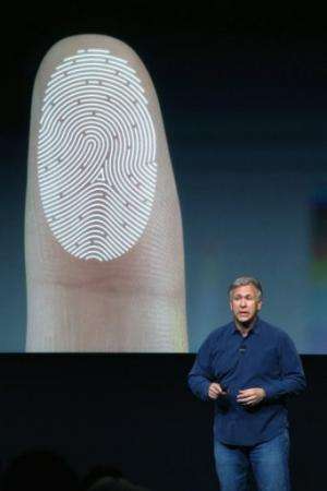 Apple Senior Vice President of Worldwide Marketing Phil Schiller speaks about the new iPhone on September 10, 2013
