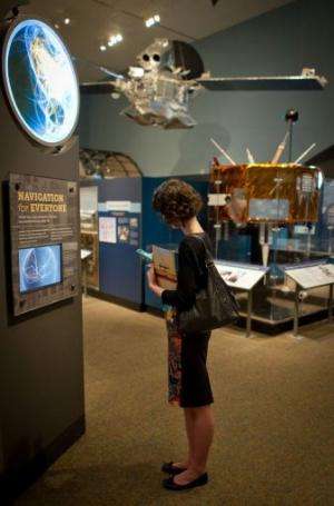 A visitor explores the &quot;Time and Navigation&quot; exhibition at the Smithsonian National Air and Space Museum, April 10, 20