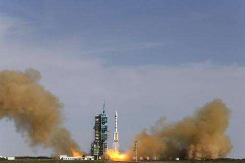 China's Shenzhou-10 rocket blasts off from the Jiuquan space centre in China's Gansu province on June 11, 2013