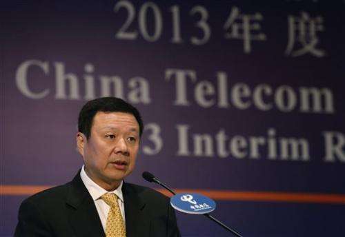 China Telecom profit rises after it offers iPhone