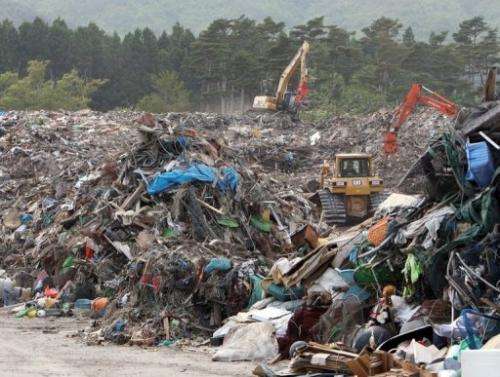Earthquake and tsunami debris lie at Yamada town in Iwate prefecture on June 6, 2011