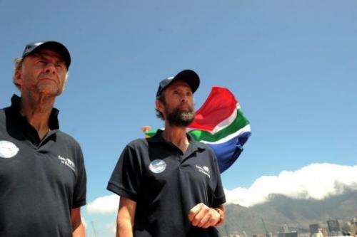 Explorers Sir Ranulph Fiennes (L) and Anton Bowring meet journalists on January 6, 2013, in Cape Town