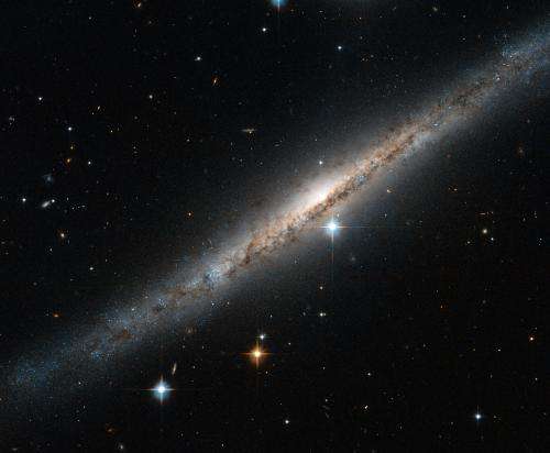 Hubble Catches a Side-on Spiral Streak