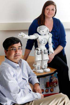 Humanoid robot helps train children with autism