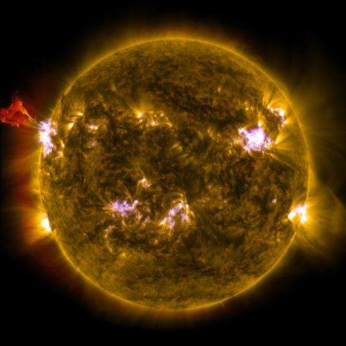 NASA sees sun emit mid-level flare