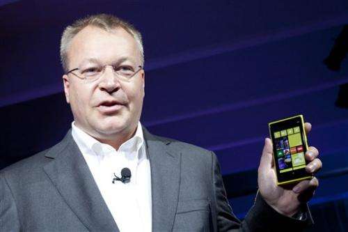 Nokia cuts losses but sales continue to plummet