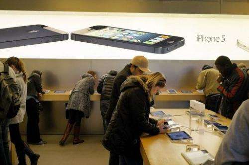 People browse at an Apple store on January 14, 2013 in New York City