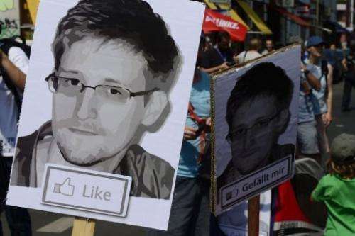 People take part in a protest against the US National Security Agency (NSA) in Berlin on July 27, 2013