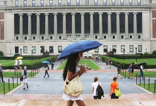 People walk on the Columbia University campus on July 1, 2013 in New York City