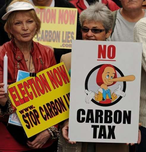 Protesters rallyin Sydney against plans to introduce a carbon tax, on July 1, 2011