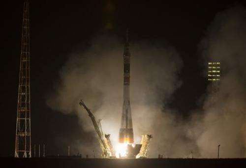 Russian spaceship docks with orbiting station