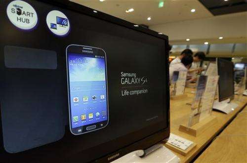 Samsung forecasts record profit but shares tumble