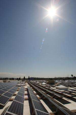 Solar panels cover the roof of a Sam's Club store in Glendora, California that was toured by California Gov. Arnold Schwarzenegg