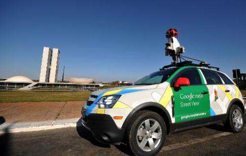 The Google street view mapping and camera vehicle stands in front of the National Congress as it charts the streets of Brasília,