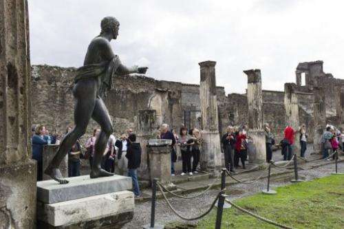 Tourists visit the Roman site of Pompei on October 27, 2011