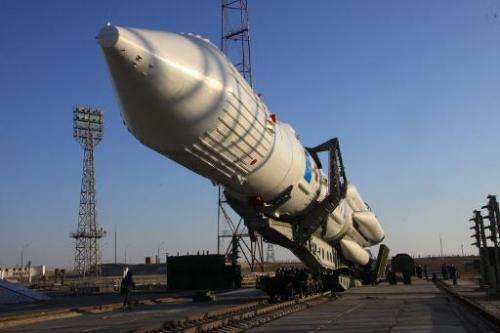 This file photo shows a Proton-M rocket, seen being rised to the launch pad at the Russian leased Baikonur cosmodrome in Kazakhs
