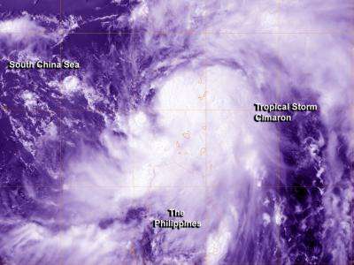 NASA sees Tropical Storm Cimaron pass between Taiwan and the Philippines