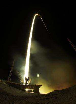 Russian spaceship docks with orbiting station