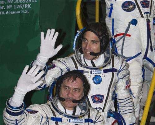 US-Russian crew blasts off for space station