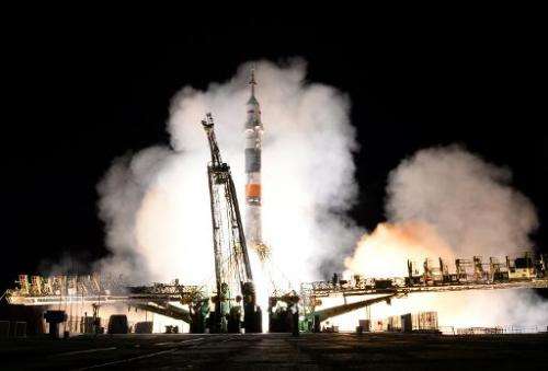A Russian Soyuz-FG rocket blasts off from the Baikonur cosmodrome in Kazakhstan early on September 26, 2013