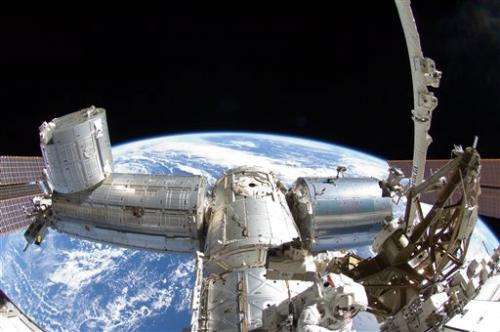 Astronaut may get Christmas wish for spacewalk