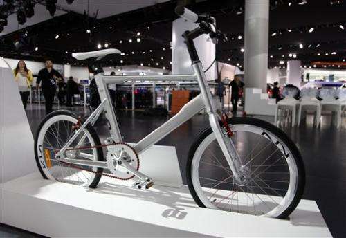 Bikes share space with cars at Detroit auto show