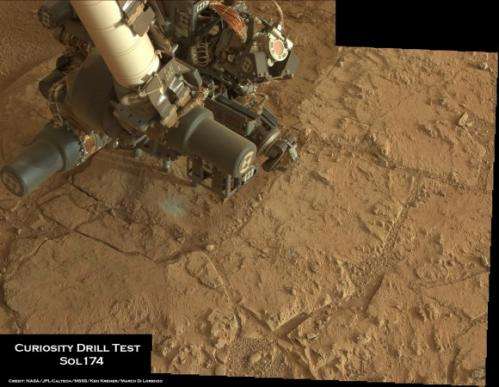 Curiosity hammers into Mars rock in historic feat