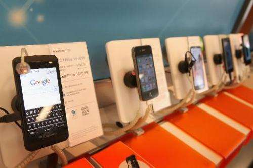 Smartphones are on display at an AT&amp;T store in Chicago, Illinois, March 28, 2013