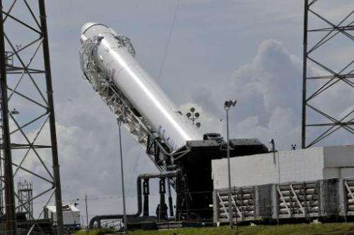 SpaceX's Falcon 9 rocket is readied on October 7, 2012 for an evening launch from Cape Canaveral, Florida