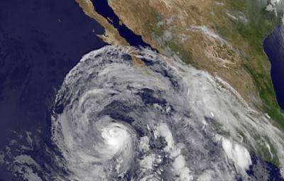 NASA satellites see Eastern Pacific's hurricane Cosme weaken