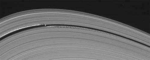 Saturn’s little wavemaking moon