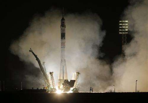 US-Russian crew blasts off for space station