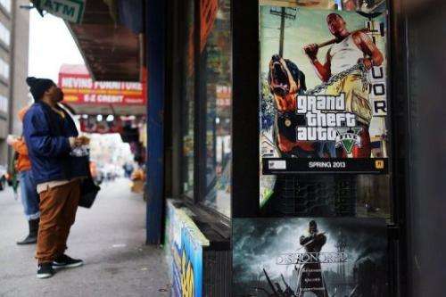 An advertisement for the new Grand Theft Auto displayed outside of a gaming store on January 11, 2013 in New York City