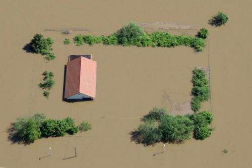 An aerial view shows a flooded house near Meissen, eastern Germany on June 5, 2013