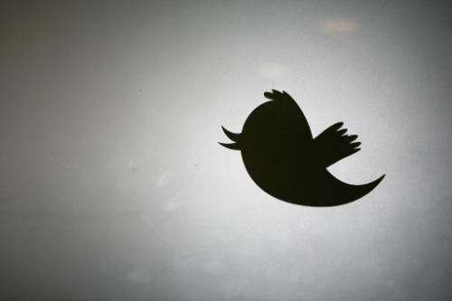 The Twitter logo displayed at the entrance of Twitter headquarters in San Francisco, California on March 11, 2011