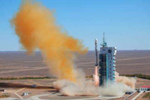 This file photo shows a rocket taking off with a satellite, in Jiuquan, China, on September 29, 2012